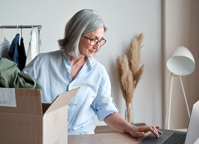 Older woman packing for move