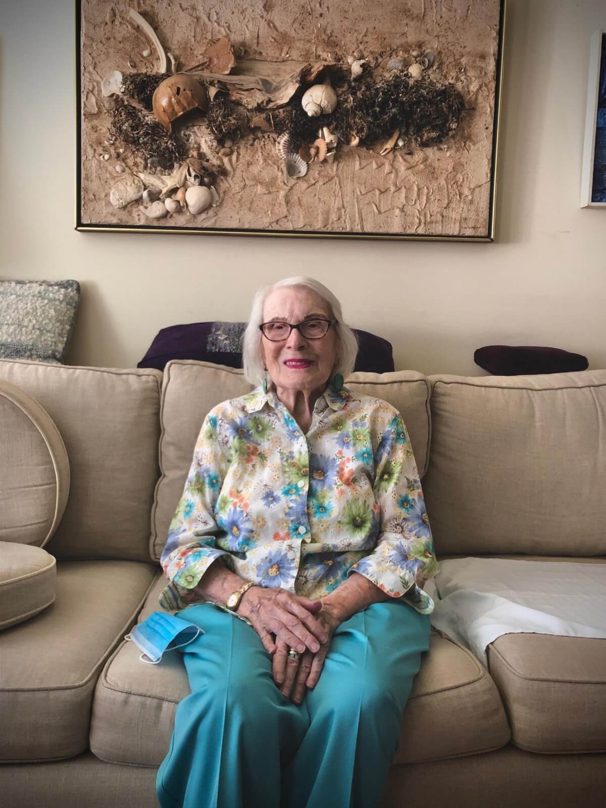 Senior woman sitting on couch