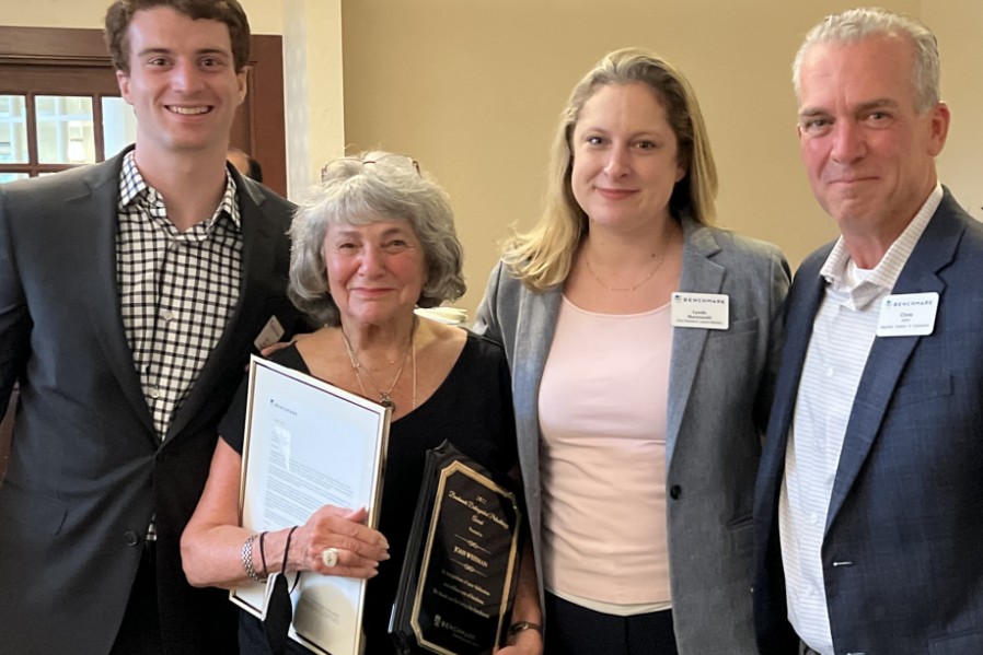 Joan Weisman and Benchmark staff at award ceremony