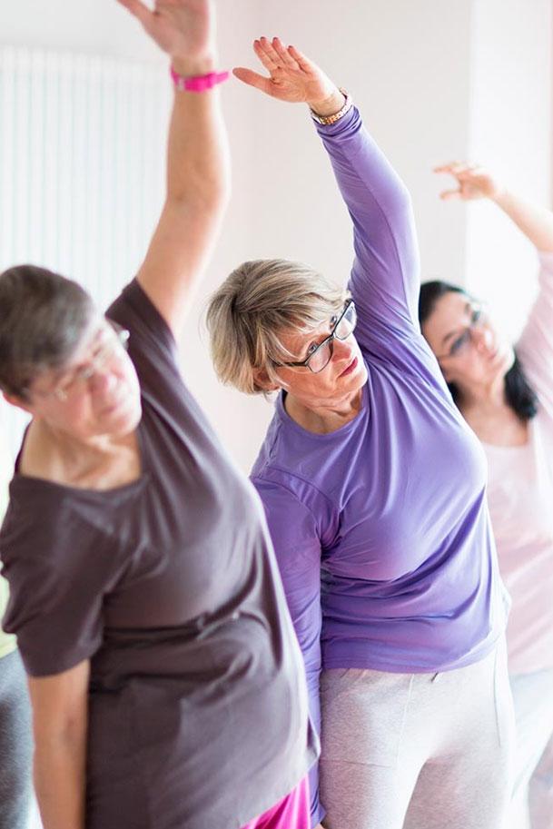 Older woman in exercise class