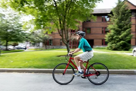 Senior man riding bike