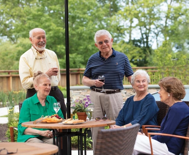 Seniors having drinks outdoors