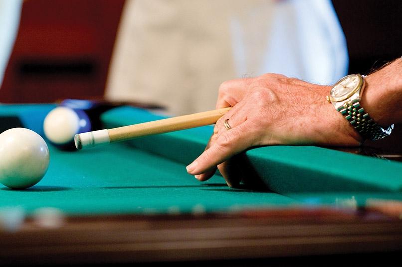 Man playing billiards
