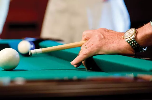 Man playing billiards