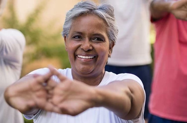 Senior woman in exercise class