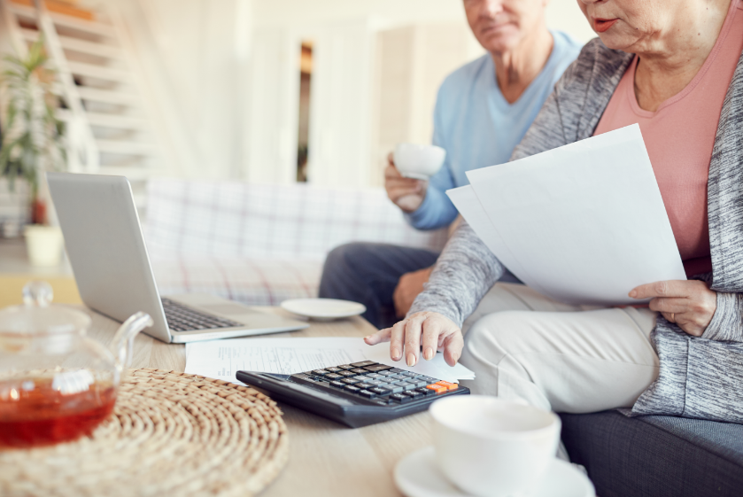 Senior couple examining taxes