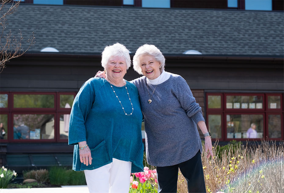 Exterior rooftop resident Patricia Margolies Judy Schedler walking